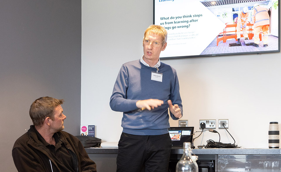 image of a colleague presenting to an audience